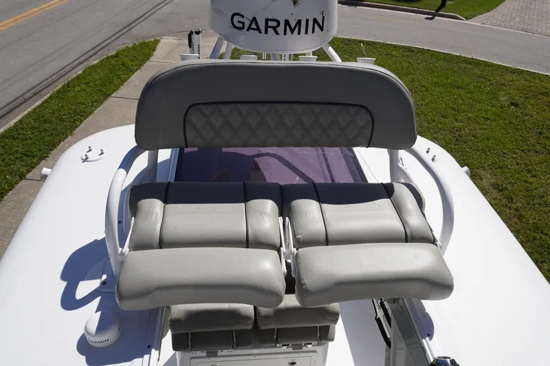 Slide: The Image of 2024 Sportsman Masters 267OE Bay Boat helm seat with Garmin equipment. - 50