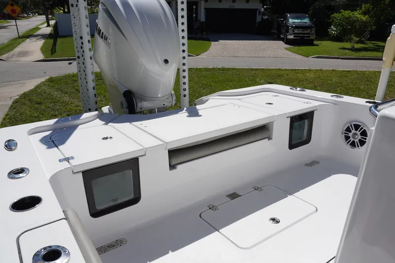 Slide: The Image of 2024 Sportsman Masters 267OE Bay Boat with Yamaha engine, featuring spacious deck layout. - 13