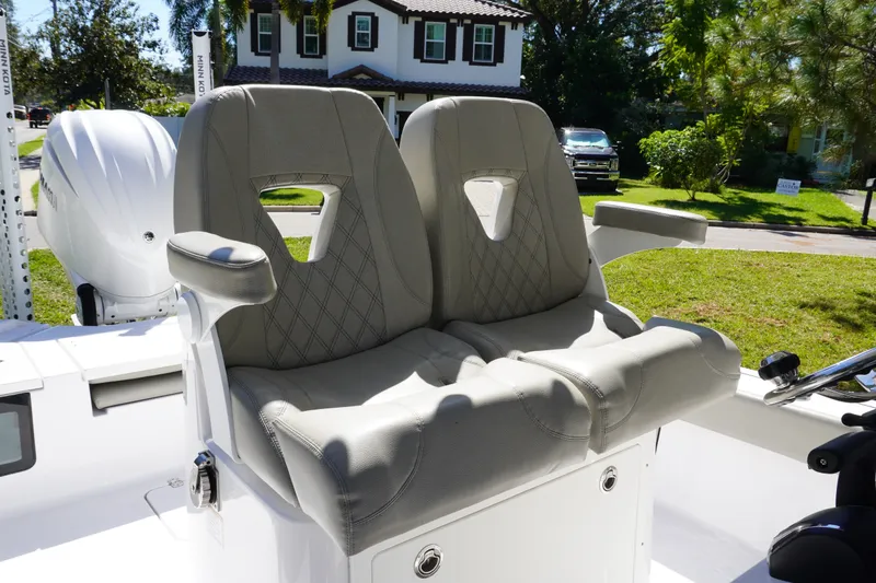 Slide: The Image of 2024 Sportsman Masters 267OE Bay Boat with dual cushioned seats and modern design. - 29