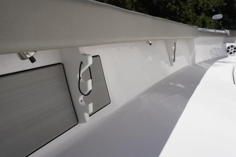 Slide: The Image of 2024 Sportsman Masters 267OE Bay Boat interior detail, showcasing sleek design and storage features. - 36