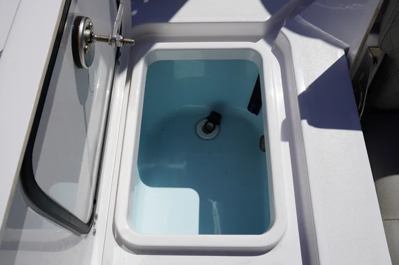 Slide: The Image of Open storage compartment on 2024 Sportsman Masters 267OE Bay Boat. - 17