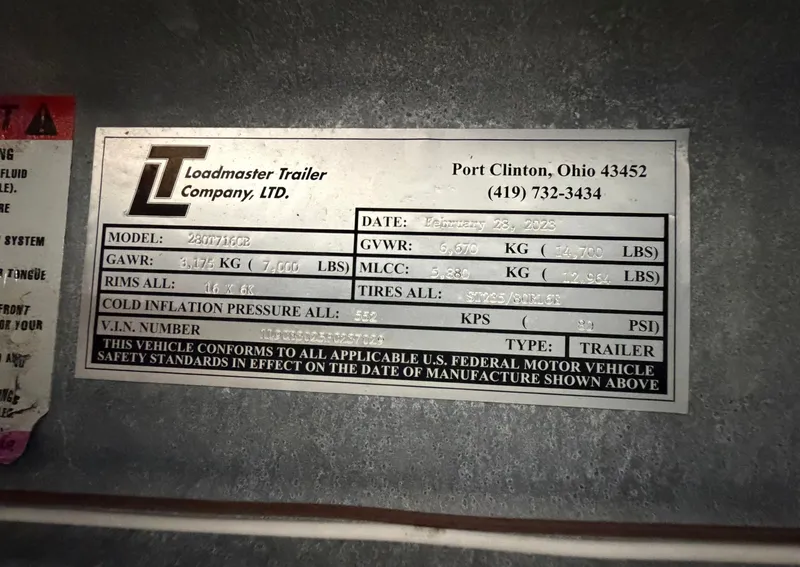 Slide: The Image of Loadmaster trailer specification plate with technical details and contact information. - 37