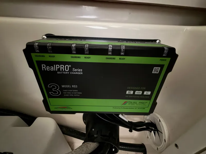 Slide: The Image of A RealPRO Series battery charger is installed in a boat. - 15