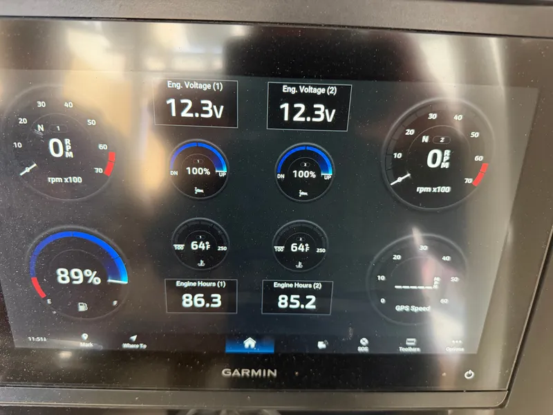 Slide: The Image of Garmin screen displaying boat data such as voltage, RPM, and engine hours. - 26