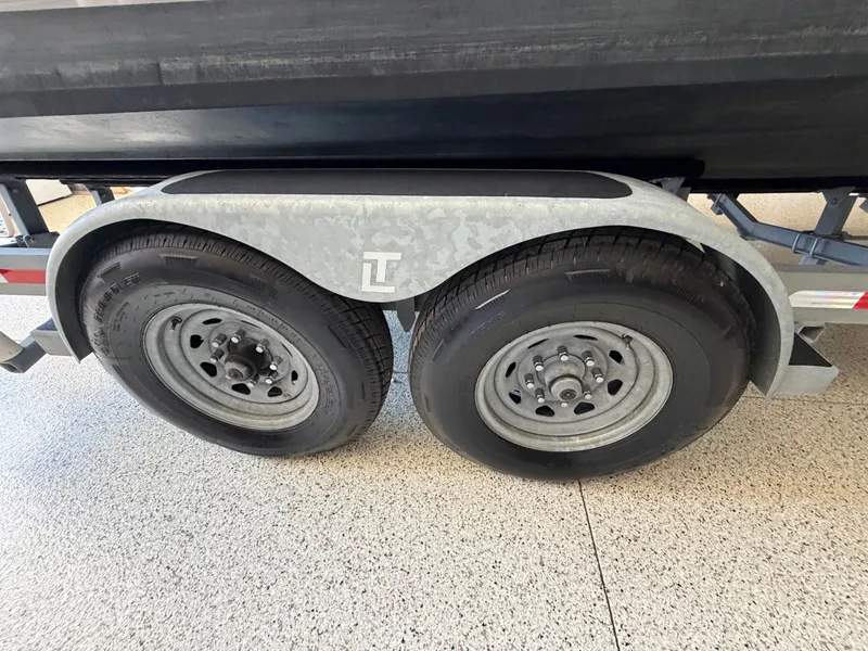 Slide: The Image of Close-up of a boat trailer with two wheels. - 38