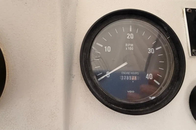 Slide: The Image of RPM gauge of 2001 Mainship Pilot 34 showing 1785 engine hours. - 18