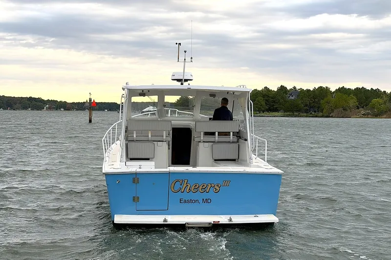 Slide: The Image of 2001 Mainship Pilot 34 boat named "Cheers" on water near Easton, MD. - 46