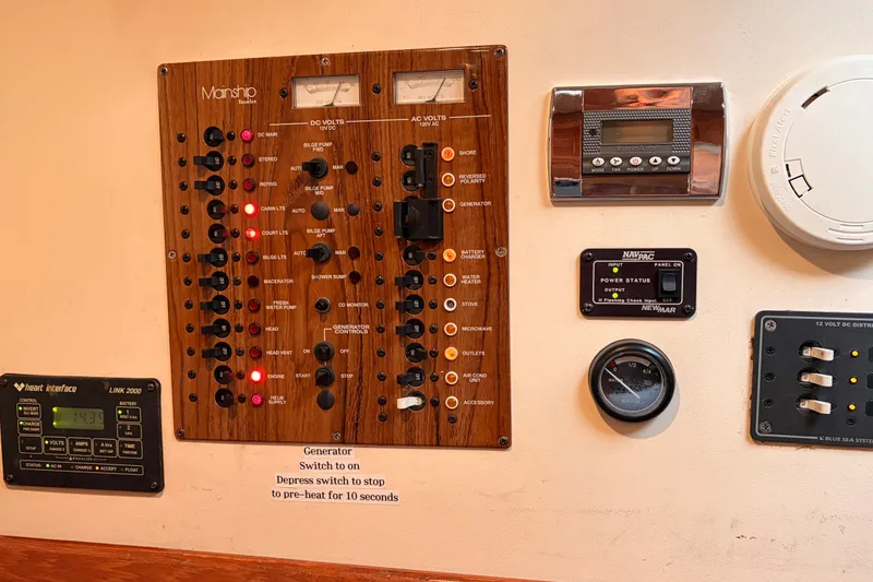 Slide: The Image of Electrical control panel on a 2001 Mainship Pilot 34 boat. - 36