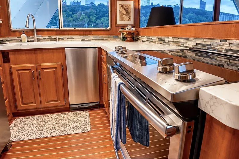 Slide: The Image of Luxurious kitchen interior of 1991 Tollycraft 61 Pilothouse Motor Yacht with modern appliances. - 20
