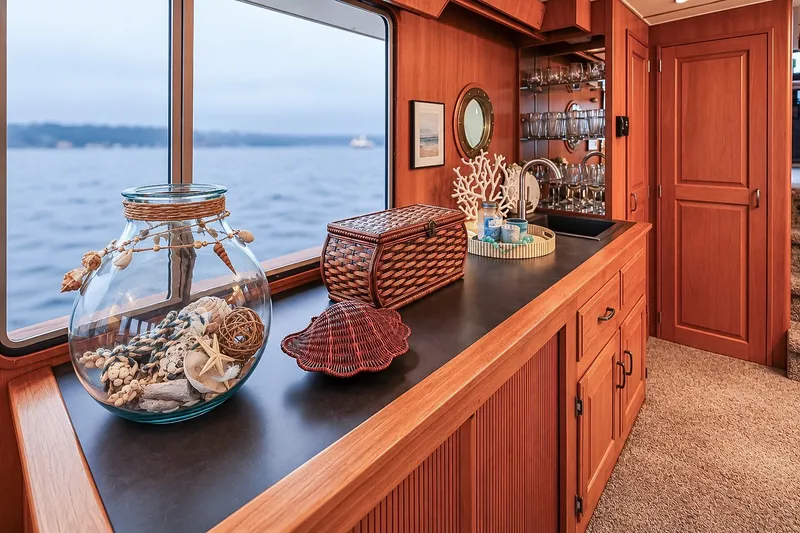 Slide: The Image of Luxurious interior of 1991 Tollycraft 61 Pilothouse Motor Yacht with elegant decor and ocean view. - 17