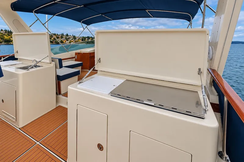 Slide: The Image of Outdoor kitchen on 1991 Tollycraft 61 Pilothouse Motor Yacht with ocean view. - 55