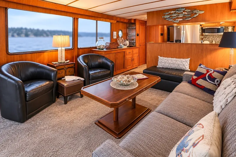 Slide: The Image of Luxurious interior of 1991 Tollycraft 61 Pilothouse Motor Yacht with elegant furnishings. - 12
