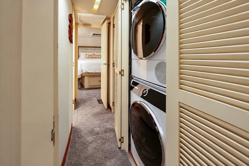 Slide: The Image of Laundry area and hallway in 1991 Tollycraft 61 Pilothouse Motor Yacht. - 34