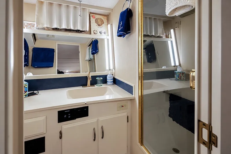 Slide: The Image of Bathroom interior of 1991 Tollycraft 61 Pilothouse Motor Yacht with sink and mirror. - 41