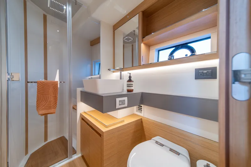 Slide: The Image of Luxurious bathroom in 2023 Pardo Yachts GT52, featuring modern fixtures and elegant wood accents. - 41