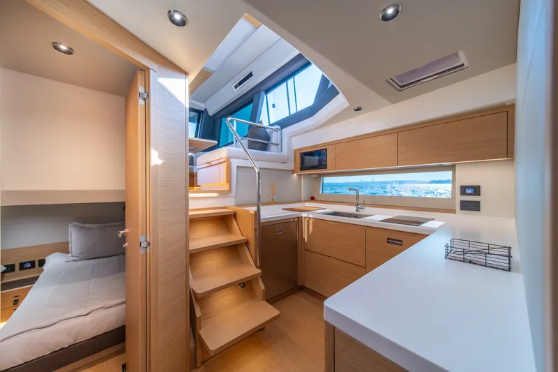 Slide: The Image of Luxurious interior of 2023 Pardo Yachts GT52, featuring modern kitchen and cozy cabin. - 29
