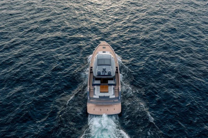 Slide: The Image of 2023 Pardo Yachts GT52 cruising on open water, aerial view. - 11