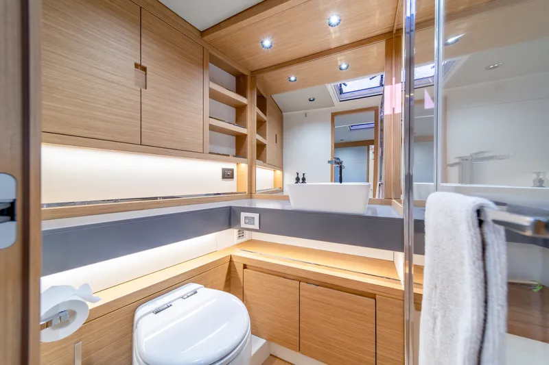Slide: The Image of Luxurious bathroom interior of 2023 Pardo Yachts GT52 with modern fixtures and wooden cabinetry. - 36