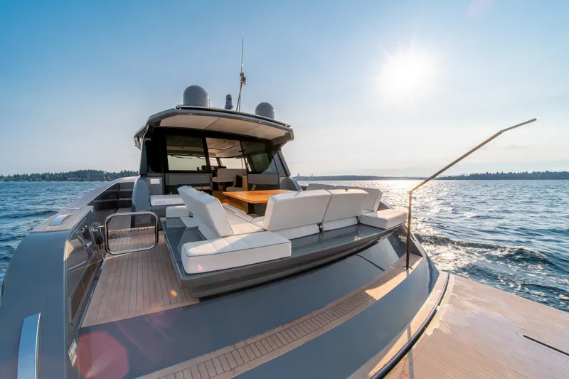 Slide: The Image of 2023 Pardo Yachts GT52 cruising on sunny waters with luxurious deck seating. - 15