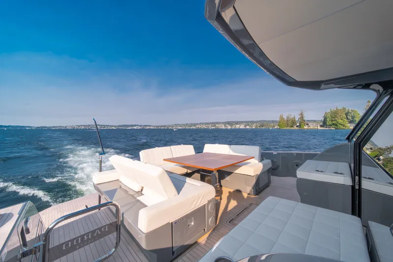 Slide: The Image of Luxurious 2023 Pardo Yachts GT52 cruising on open water with elegant seating area. - 18