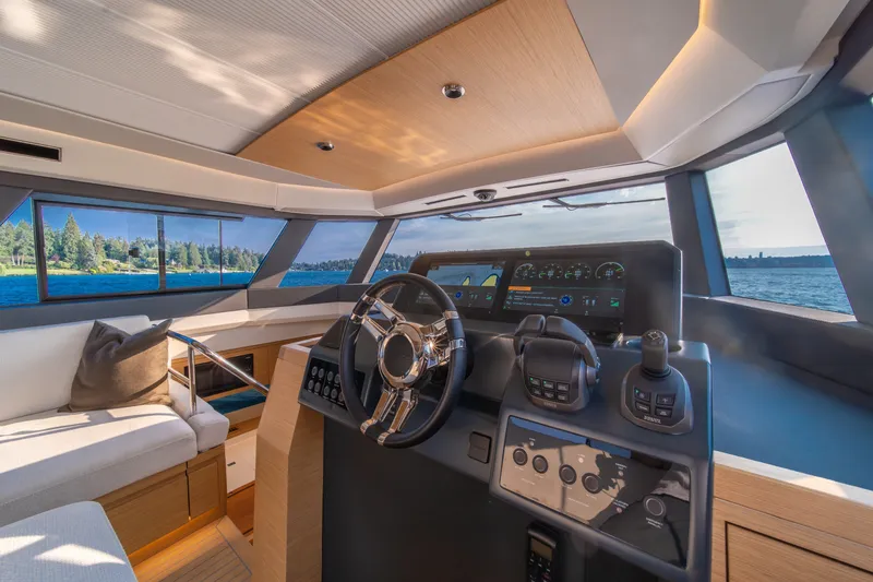 Slide: The Image of Luxurious 2023 Pardo Yachts GT52 interior with modern helm and panoramic windows. - 28