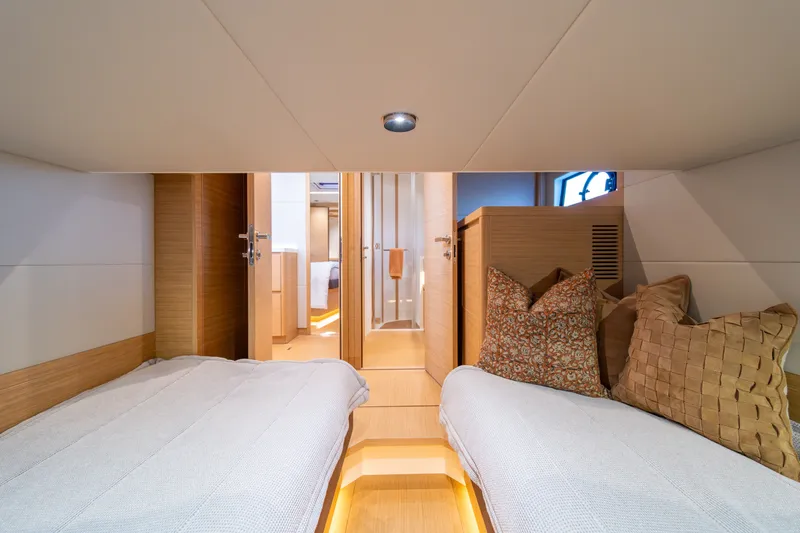 Slide: The Image of Luxurious interior cabin of 2023 Pardo Yachts GT52 with twin beds and elegant decor. - 39