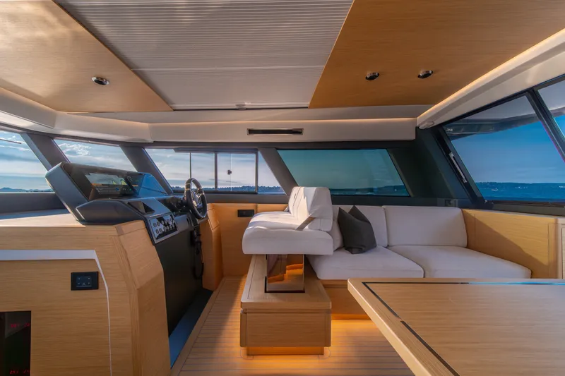 Slide: The Image of Luxurious interior of 2023 Pardo Yachts GT52 with modern helm and seating area. - 25
