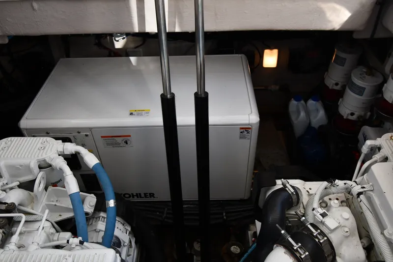 Slide: The Image of Engine room of 2017 Sea Ray Sundancer 400 with Kohler generator and mechanical components. - 53