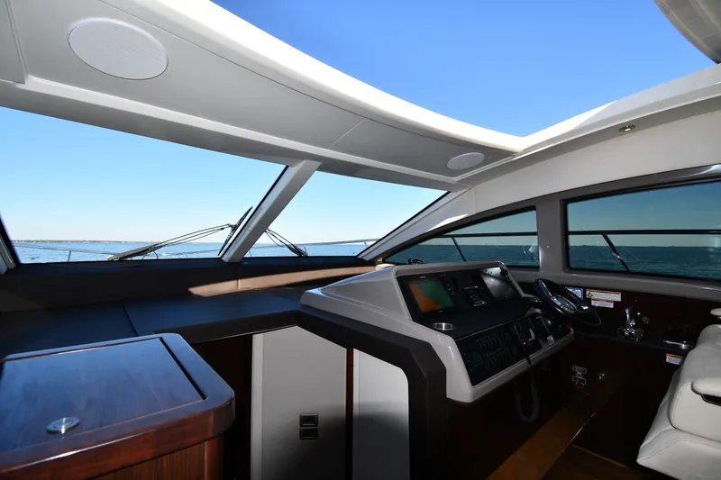 Slide: The Image of Interior helm of 2017 Sea Ray Sundancer 400 yacht with ocean view. - 36