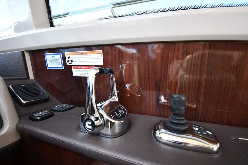 Slide: The Image of Control panel of a 2017 Sea Ray Sundancer 400 yacht with wood finish. - 40
