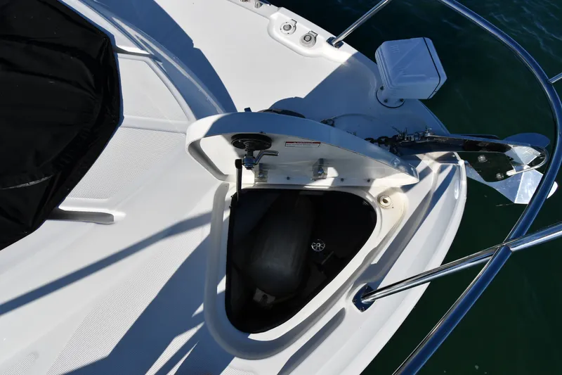 Slide: The Image of 2017 Sea Ray Sundancer 400 anchor compartment with open hatch on deck. - 4
