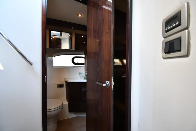 Slide: The Image of Luxurious bathroom interior of 2017 Sea Ray Sundancer 400 yacht, featuring modern fixtures. - 25