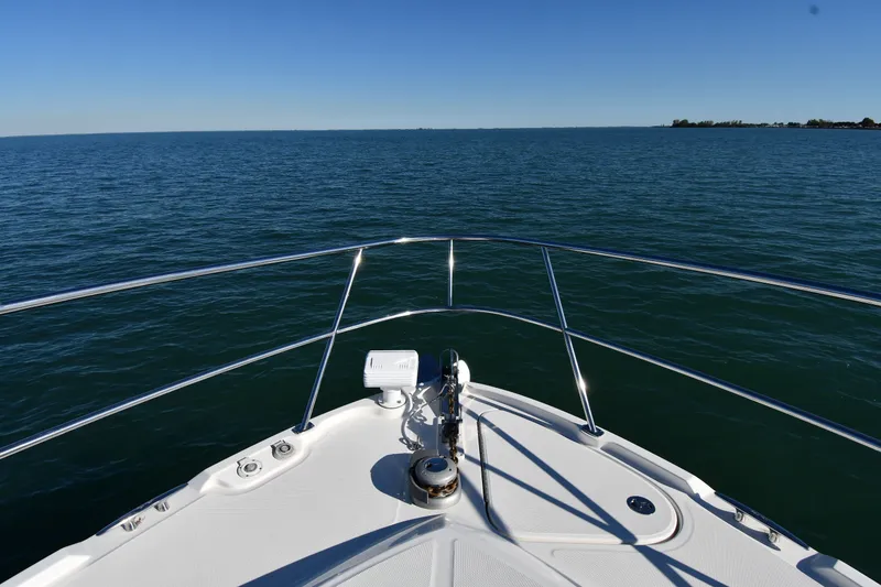 Slide: The Image of Bow view of 2017 Sea Ray Sundancer 400 yacht on open water. - 3