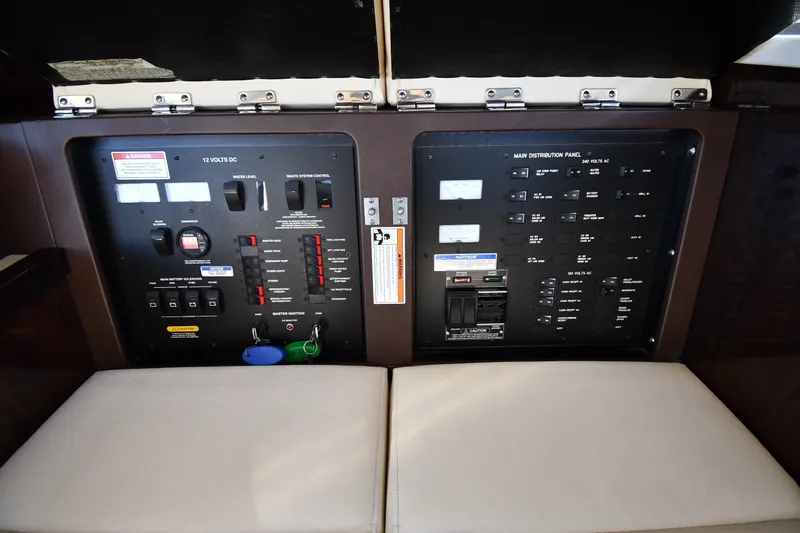 Slide: The Image of Electrical control panel on a 2017 Sea Ray Sundancer 400 yacht. - 48