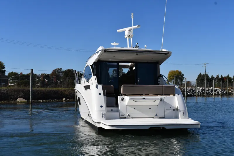 Slide: The Image of 2017 Sea Ray Sundancer 400 yacht cruising on a clear day. - 1