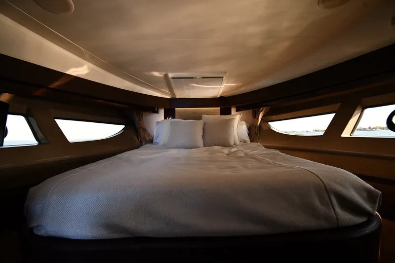 Slide: The Image of Luxurious bedroom interior of 2017 Sea Ray Sundancer 400 yacht with elegant bedding. - 16