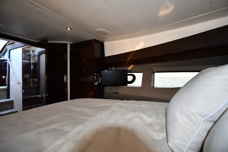 Slide: The Image of Luxurious cabin interior of 2017 Sea Ray Sundancer 400 yacht with bed and TV. - 19