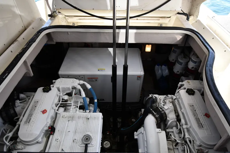Slide: The Image of Engine compartment of 2017 Sea Ray Sundancer 400 yacht, featuring dual engines and equipment. - 50