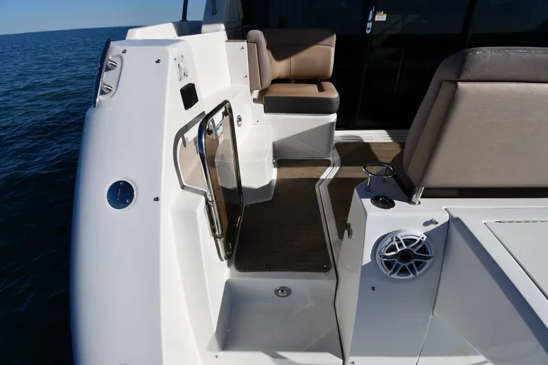 Slide: The Image of 2017 Sea Ray Sundancer 400 yacht deck with seating and ocean view. - 11