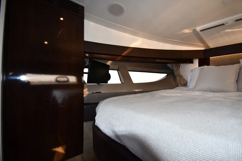 Slide: The Image of Luxurious interior cabin of 2017 Sea Ray Sundancer 400 yacht with cozy bedding. - 18