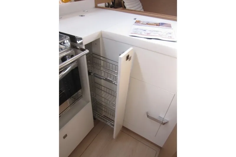 Slide: The Image of Modern kitchen storage in 2027 Jeanneau Sun Odyssey 455 yacht. - 6