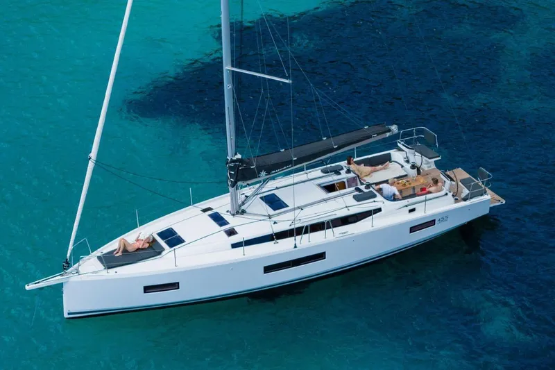 Slide: The Image of Manufacturer Provided Image: 2026 Jeanneau Sun Odyssey 455 sailing on clear turquoise waters. - 44