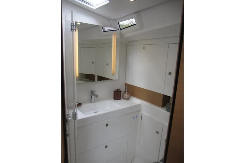 Slide: The Image of Modern bathroom interior of 2027 Jeanneau Sun Odyssey 455 yacht, featuring sleek design and fixtures. - 15