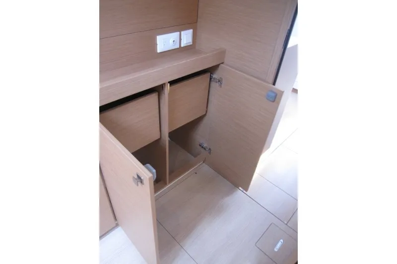 Slide: The Image of Interior storage cabinets on the 2027 Jeanneau Sun Odyssey 455 yacht. - 18