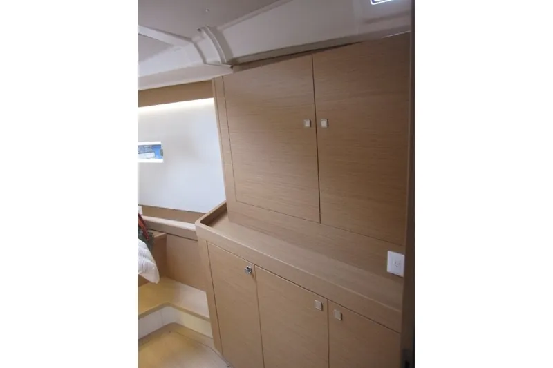 Slide: The Image of Interior of 2027 Jeanneau Sun Odyssey 455 yacht with wooden cabinetry. - 17