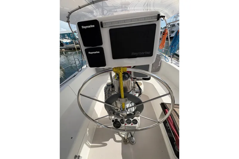 Slide: The Image of Steering wheel and navigation equipment on a 2004 Catalina 310 sailboat. - 11