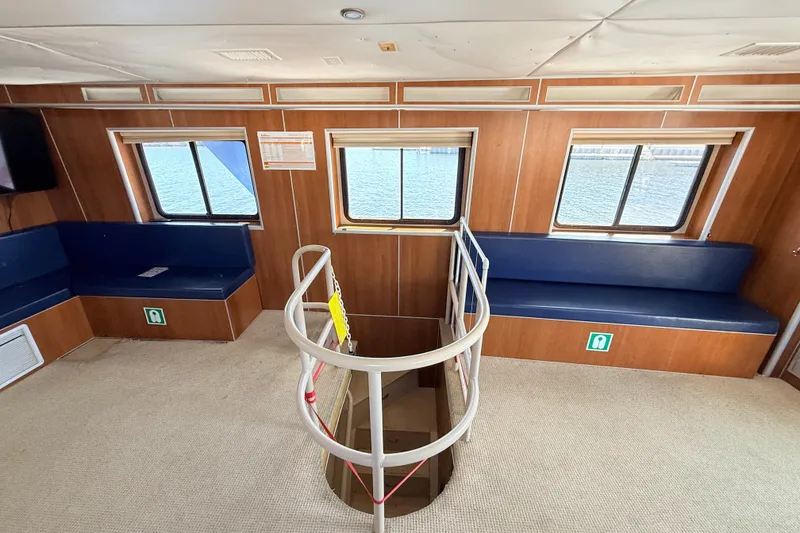 Slide: The Image of Interior of 2013 Silver Ships Inc Barrows 60 with seating and stairwell. - 35