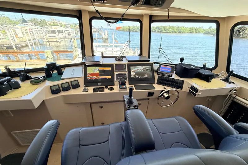 Slide: The Image of Interior view of 2013 Silver Ships Inc Barrows 60 boat cockpit with navigation equipment. - 25