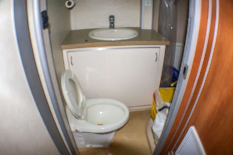 Slide: The Image of Compact bathroom on 2013 Silver Ships Barrows 60, featuring toilet and sink. - 20