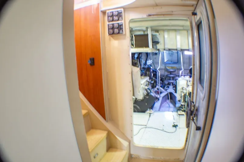 Slide: The Image of Engine room interior of 2013 Silver Ships Inc Barrows 60, showcasing machinery and access stairs. - 17